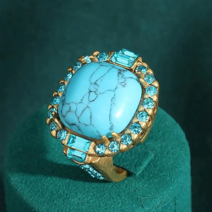 Anello in Zirconia con Pietra Turchese Dorata