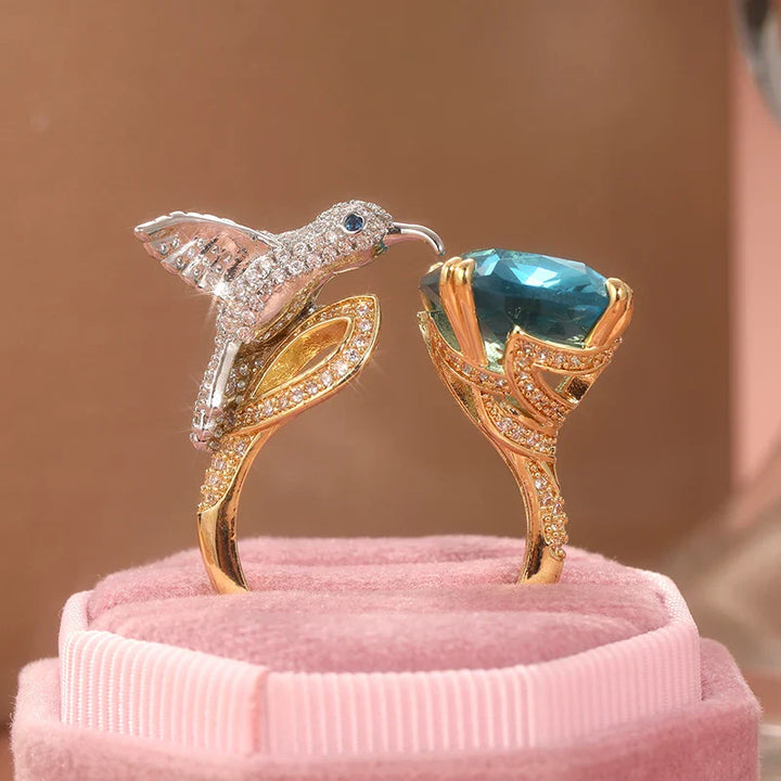 Anello Regolabile Colore Acquamarina con Colibrì – Placcato Oro 14K