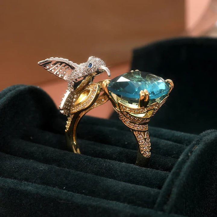 Anello Regolabile Colore Acquamarina con Colibrì – Placcato Oro 14K